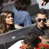 Cristiano Ronaldo dans les gradins du Master 1000 de Madrid le 4 mai 2011. Les lunettes de soleil ne suffisent pas à cacher son identité