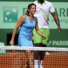 Amélie Mauresmo et Teddy Riner, une équipe pour le meilleur... et pour le rire ! Samedi 21 mai 2011, chaude ambiance à la Porte d'Auteuil, pour l'ouverture des Internationaux de France de Roland-Garros !