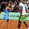 Amélie Mauresmo et Teddy Riner, une équipe pour le meilleur... et pour le rire ! Samedi 21 mai 2011, chaude ambiance à la Porte d'Auteuil, pour l'ouverture des Internationaux de France de Roland-Garros !