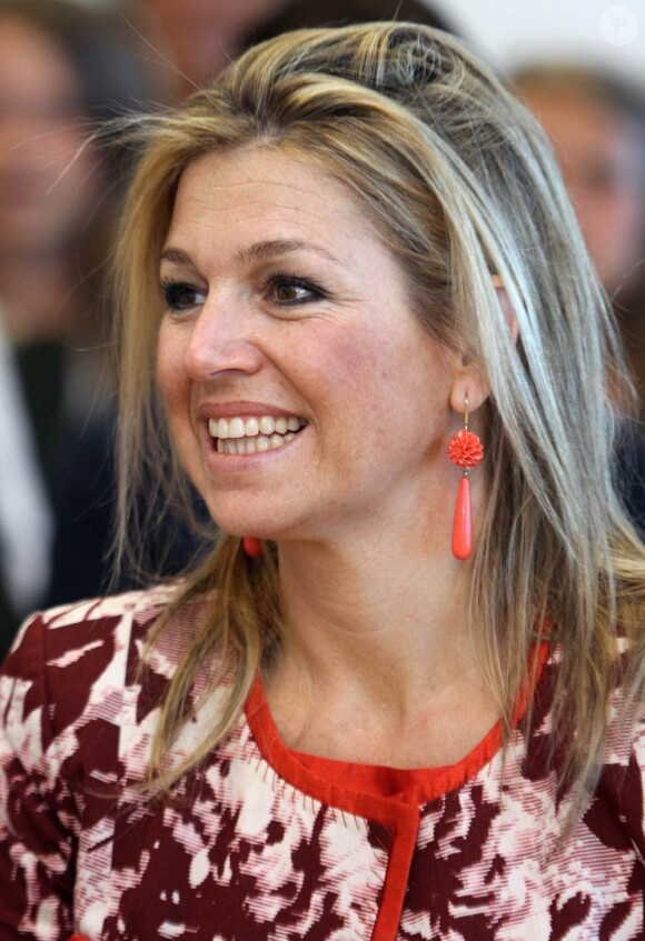 Le 1er juin 2011, la princesse Maxima des Pays-Bas se trouvait à Rotterdam pour voir la remise des premiers diplômes d'un programme gouvernemental visant à enseigner aux écoliers à bien utiliser leur argent.
