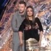 Mila Kunis et Justin Timberlake s'amusent et se pelottent avec humour lors des 20e MTV Movie Awards, à Los Angeles, le 5 juin 2011.