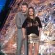 Mila Kunis et Justin Timberlake s'amusent et se pelottent avec humour lors des 20e MTV Movie Awards, à Los Angeles, le 5 juin 2011.