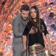 Mila Kunis et Justin Timberlake se pelottent avec humour lors des 20e MTV Movie Awards, à Los Angeles, le 5 juin 2011.