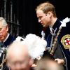 Le prince Charles et son fils William, duc de Cambridge lors de la cérémonie annuelle de l'Ordre de la jarretière dans la chapelle Saint George à Windsor le 13 juin 2011