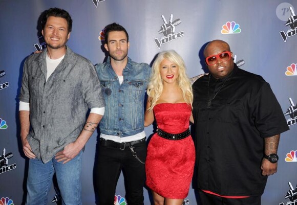 Les jurés Christina Aguilera, Adam Levine de Maroon 5, Blake Shelton et Cee Lo Green posent pour la promotion de l'émission de NBC The Voice en mars 2011 à Los Angeles