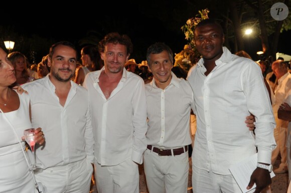 FX Demaison, Jean-Paul Rouve, Nagui et Marcel Dessailly lors de la soirée blanche aux Moulins de Ramatuelle. Dimanche 10 juillet 2011