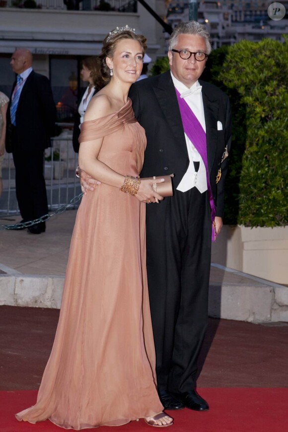 Le prince Laurent de Belgique et son épouse la princesse Claire (photo : le 2 juillet 2011 à Monaco pour le dîner du mariage d'Albert et Charlene) sont exclus des représentations officielles de la famille royale, dont les cérémonies de la Fête Nationale du 21 juillet 2011.