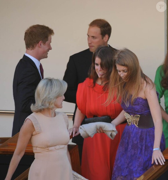 Le prince Harry, le prince William, la princesse Beatrice et la princesse Eugenie lors d'une soirée placée sous le signe du mariage de Zara Phillips et Mike Tindall, sur le yacht Britannia. Vendredi 29 juillet 2011