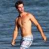 Patrick Schwarzenegger dévoile son corps de mannequin sur une plage de Malibu le 20 août 2011