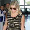 Fergie arrive à l'aéroport de Miami le 13 septembre 2011