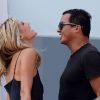 Heidi Klum tout sourire en plein tournage d'une publicité pour AOL, le 15 septembre 2011 à Los Angeles