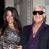 Barbara Gandolfi et Jean-Paul Belmondo lors du défilé de Roberto Cavalli à Milan dans le cadre de la fashion week printemps-été 2012, le 26 septembre 2011