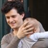 Orlando Bloom dans les rues de Paris le 28 septembre 2011 avec son adorable fiston Flynn dans les bras 