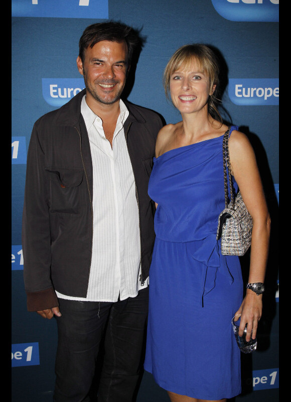 François Ozon et Karin Viard lors de l'avant-première du film Polisse dans les locaux d'Europe 1 à Paris le 3 octobre 2011