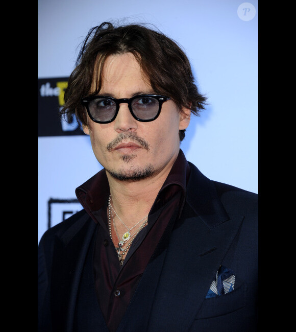 La star Johnny Depp à l'avant première de Rhum Express le 13 octobre 2011 à Los Angeles.
