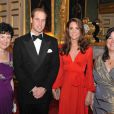  Le prince William et Kate Middleton entourés d'Anne Popkin et Amanda Pullinger, présidente et directrice de la fondation. 
 Parrain des deux organismes, le prince William, accompagné de sa divine Kate Middleton sublimée dans une robe rouge Beulah London, assistait jeudi 13 octobre 2011 au gala caritatif du 100 Women in Hedge Funds au profit de The Child Bereavement Charity. 