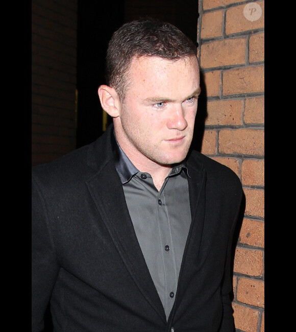 Wayne Rooney, ravi de fêter son anniversaire le 23 octobre au Wing's Chinese Restaurant de Manchester