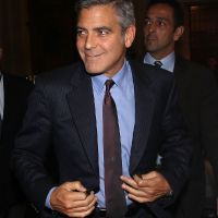 George Clooney avec une businesswoman sexy... What else ?