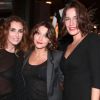 Mademoiselle Agnès, Emma de Caunes et Zoé Félix lors de la soirée shopping party de H&M pour le lancement de la collection Versace. Le 16 novembre 2011