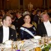 Adam G Reiss, la princesse Victoria de Suède et Brian P Schmidt lors du banquet de la cérémonie de remise des prix Nobel à Stockholm le 10 décembre 2011