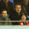 David Beckham et ses enfants Brooklyn, Romeo et Cruz, le 8 janvier 2012 à Manchester, lors de la victoire de United sur City (3-2).