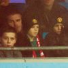 David Beckham et ses fils Brooklyn, Romeo et Cruz le 8 janvier 2012 à Manchester lors de la victoire de United sur City (3-2).