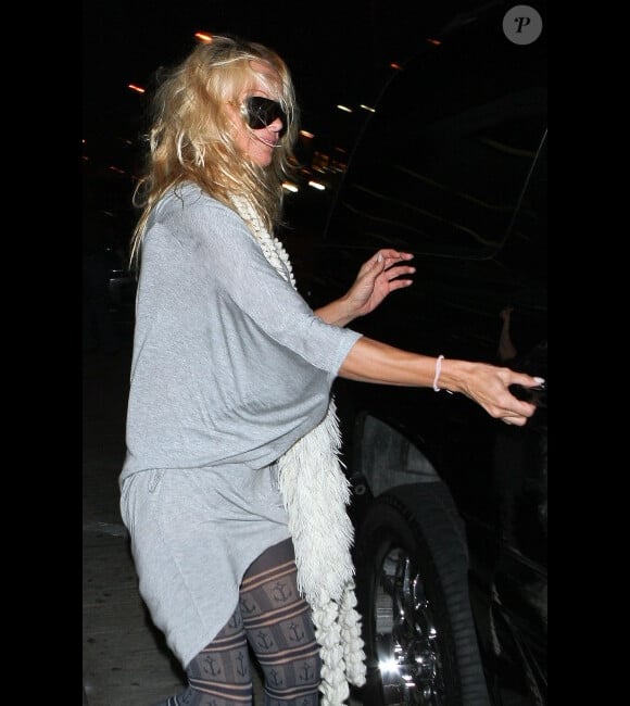 Pamela Anderson à la sortie de l'avion le 26 janvier à Los Angeles