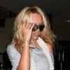 Pamela Anderson à la sortie de l'avion le 26 janvier à Los Angeles