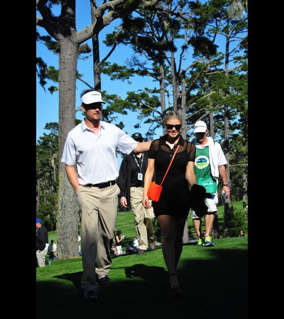 Fergie et son homme Josh Duhamel sur le terrain de golf, à Los Angeles, le 8 février 2012