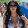 Kim Kardashian est n°5 du classement "Les plus belles femmes en maillot de bain". Ici sur la plage de Miami le 31 mars 2010