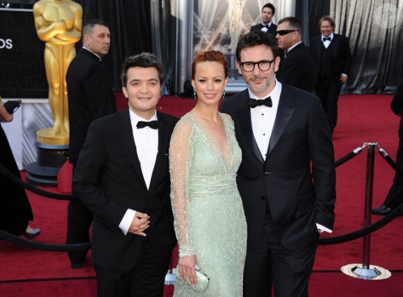 Michel Hazanavicius, Bérénice Bejo et Thomas Langmann arrivent aux Oscars, le 26 février 2012 à Los Angeles.