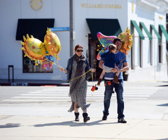 Alyson Hannigan, son époux Alexis Denisof et leur fille Satyana, à Los Angeles le 3 mars 2012.