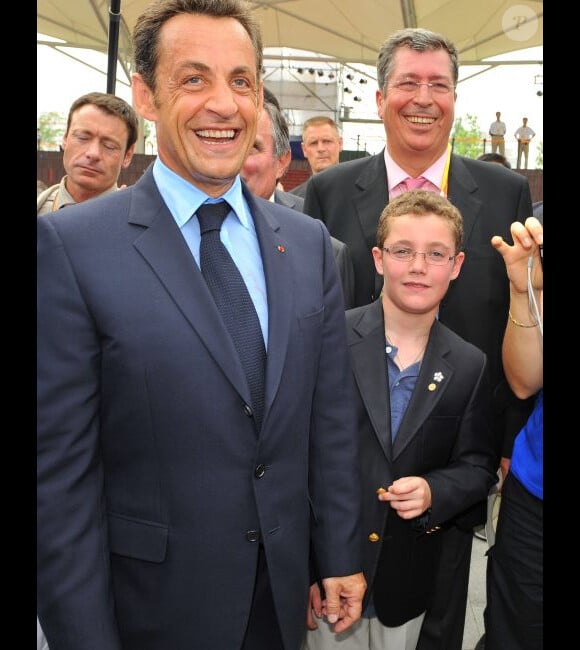 Nicolas Sarkozy et son plus jeune fils Louis en août 2008 en Chine