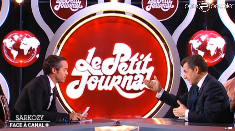 Nicolas Sarkozy Face A Yann Barthes Dans Le Petit Journal Sur Canal Le 16 Mars 2012 Purepeople