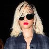 Rihanna porte une veste A.P.C. x Carhartt lors de sa sortie courses à New York, le 16 mars 2012.