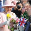 La reine Elizabeth II à Manchester avec son mari le duc d'Edimbourg le 23 mars 2012 dans le cadre de la tournée de son jubilé de diamant. Les princesses Beatrice et Eugenie d'York comptent bien jouer un rôle dans l'anniversaire des 60 ans de règne de leur grand-mère.