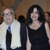 Willy Rizzo et sa femme lors du vernissage de l'exposition Helmut Newton au Grand Palais à Paris le 23 mars 2012