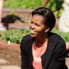 Michelle Obama organise la quatrième plantation de son potager à la Maison Blanche, Washington, le 26 mars 2012.