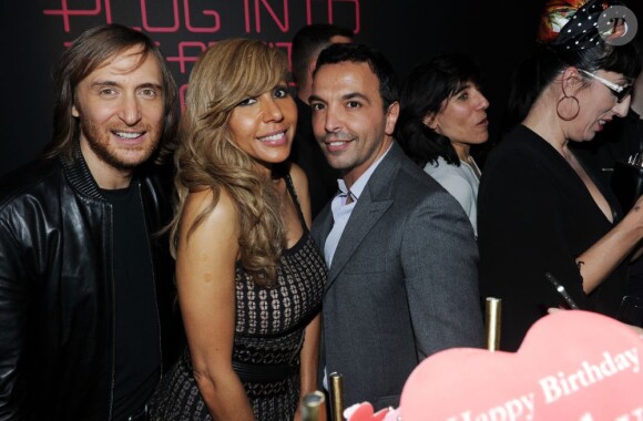 David et Cathy Guetta aux côtés de Kamel Ouali lors de la soirée de lancement de la Twizy à l'Atelier Renault sur les Champs-Elysées à Paris le mardi 28 mars 2012
