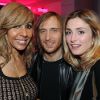 Cathy et David Guetta aux côtés de Julie Gayet lors de la soirée de lancement de la Twizy à l'Atelier Renault sur les Champs-Elysées à Paris le mardi 28 mars 2012