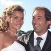 Ingrid Chauvin et son mari Thierry Peythieu lors leur mariage au Cap Ferret en août 2011