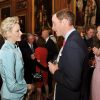 Le prince William en conversation avec la princesse Charlene, élégante en tailleur Dior. La reine Elizabeth II accueillait à déjeuner à Windsor, pour son jubilé de diamant, les souverains de 26 pays, le 18 mai 2012. Possiblement le plus grand rassemblement de têtes couronnées depuis le couronnement de la monarque en 1953.