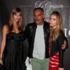 Christian Audigier fête son anniversaire chez Jean-Roch, dans son VIP ROOM de Cannes le 17 mai 2012 - ici avec sa chérie Nathalie Sorensen à gauche et sa fille Crystal à droite