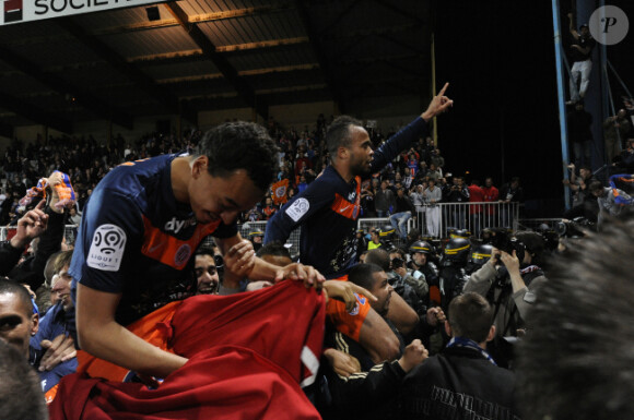 Les joueurs de l'équipe de Montpellier lors de la victoire face à l'AJA le 20 mai 2012 à Auxerre, décrochant ainsi leur premier titre de Champion de France
