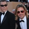 Brad Pitt monte les marches du Palais des Festivals, pour son film Cogan - La Mort en Douce, à Cannes le 22 mai 2012 - ici aux côtés de Ray Liotta