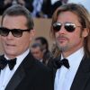 Brad Pitt monte les marches du Palais des Festivals, pour son film Cogan - La Mort en Douce, à Cannes le 22 mai 2012 - ici aux côtés de Ray Liotta