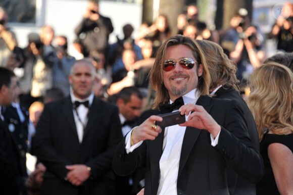 Brad Pitt monte les marches du Palais des Festivals, pour son film Cogan - La Mort en Douce, à Cannes le 22 mai 2012