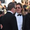 Brad Pitt monte les marches du Palais des Festivals, pour son film Cogan - La Mort en Douce, à Cannes le 22 mai 2012