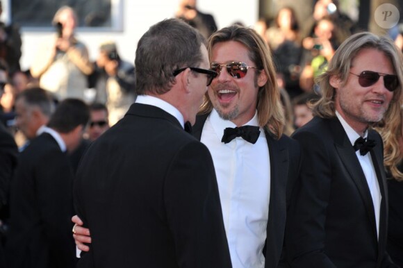 Brad Pitt monte les marches du Palais des Festivals, pour son film Cogan - La Mort en Douce, à Cannes le 22 mai 2012