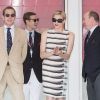 La princesse Charlene assistait aux côtés du prince Albert et de ses neveux Andrea et Pierre Casiraghi au Grand Prix de Monaco, le 27 mai 2012. A l'issue de la course, elle remettait le trophée du deuxième, l'Allemand Nico Rosberg.